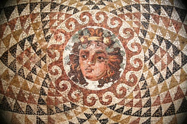Ancient Corinth - Head of Dionysus on a mosaic from the Roman villa